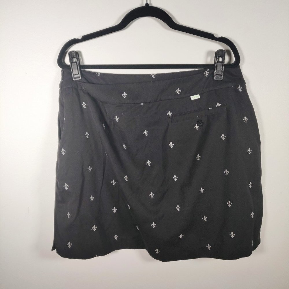 0001 IZOD black skort with grey fleur de lis